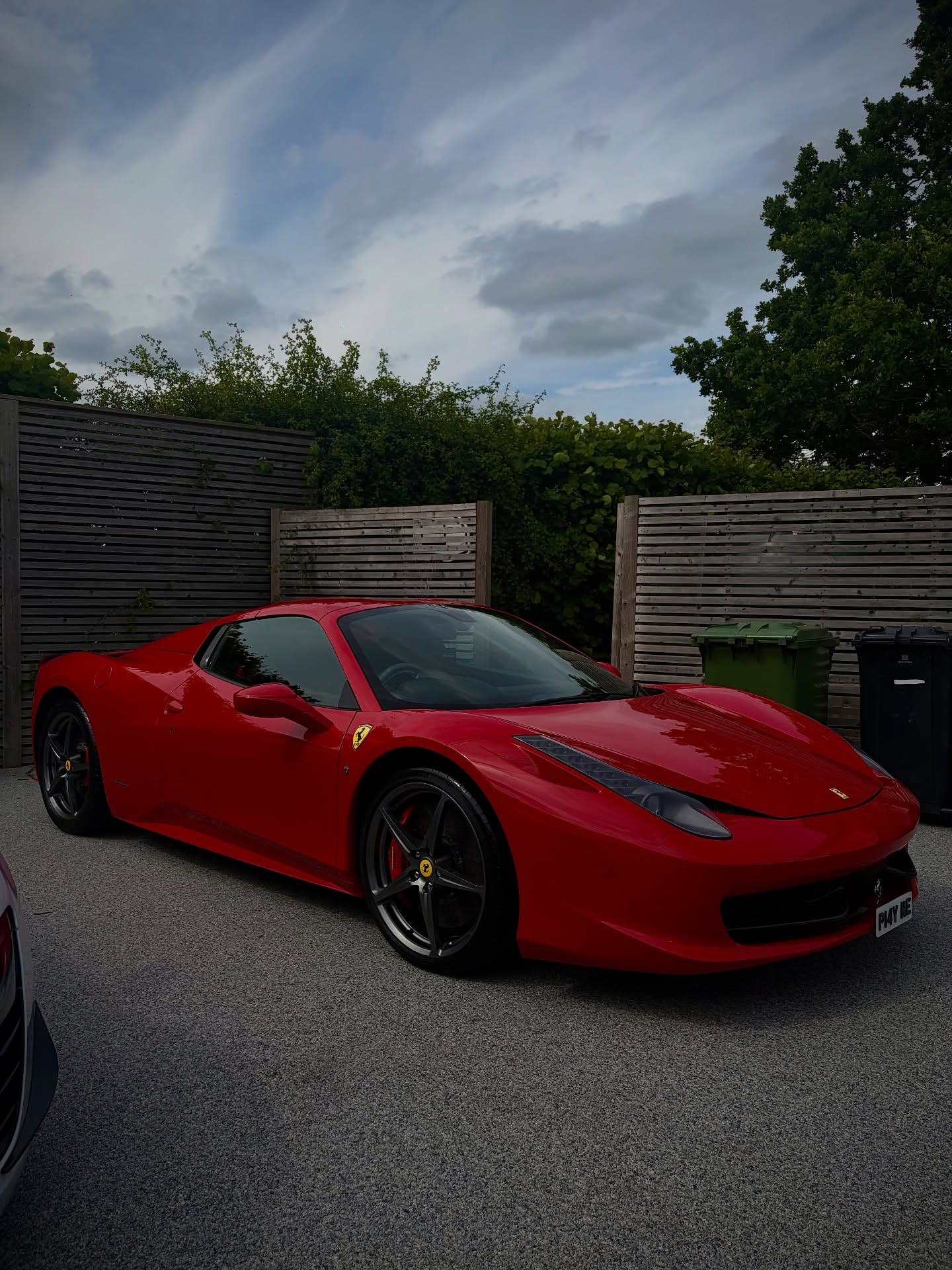Red Ferrari 458 side profile